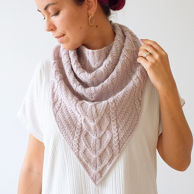 A cowl is a wonderful gift to make someone! The Mallow Cowl by Ksenia Naidyon of Life is Cozy looks like it has cables but doesn’t actually involve knitting cables.