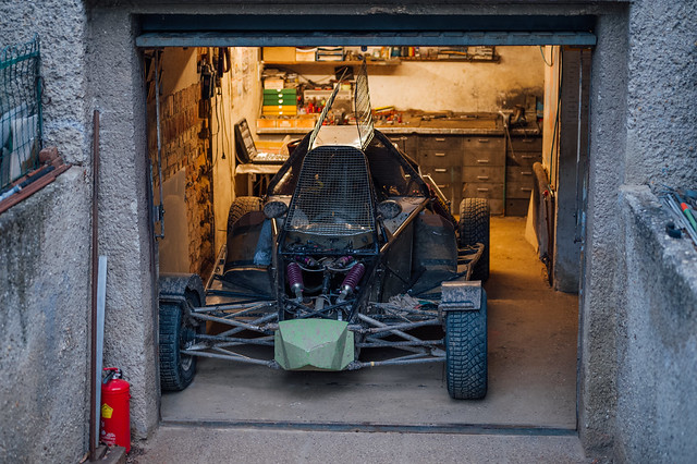 Front view of an autocross buggy in a garage