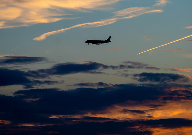 Sunset with plane