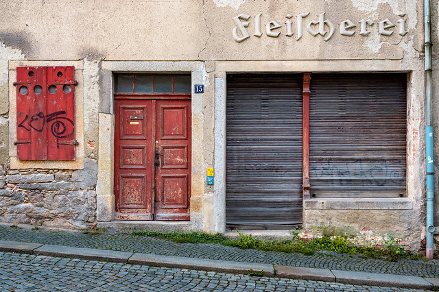 Vintage butcher's shop front, seen in Bautzen, East Saxony, East Germany.