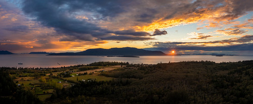 Sunset Over Orcas Island by EdBob, Beautiful and dramatic aerial sunset over Orcas Island as seen from Lummi Island, Washington. The cr