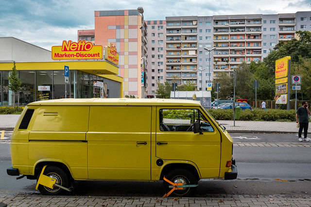 Yellow car in an East-German residential area, in Zwickau.