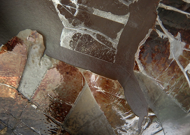 an abstract of a taped-up chair seat