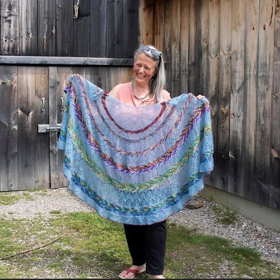 This Gertrude McFuzz shawl by Marin Melchior of MarinJaKnits is named after a character from the musical “Suessical”. It is designed to be knit combining fingering weight yarn with lace weight mohair/silk or completely in fingering weight yarn.