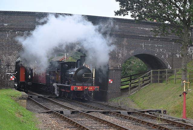 With its steam exhaust swirling under the bridge, Y14 No.564 departs Weybourne, with the 13.37 service from Sheringham to Holt. North Norfolk Railway. 04 09 2021