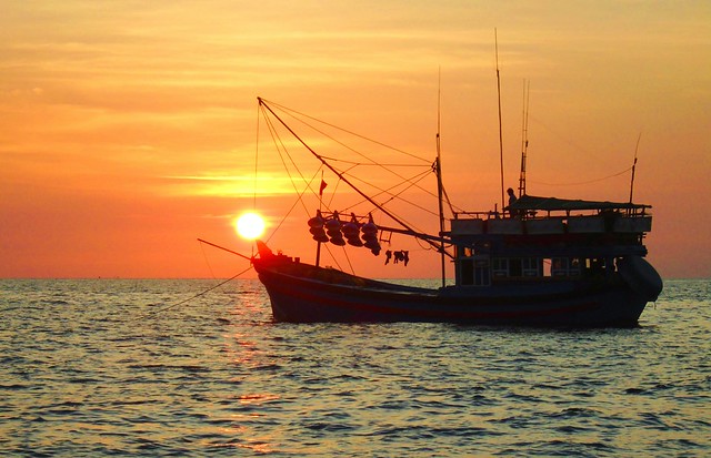Fishing boat on the sea in the sunset time in Phu Quoc Island, Vietnam