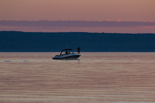 Boating at sunset, Waskesiu Lake, Prince Albert National Park, Saskatchewan