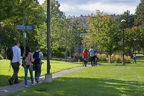 Students walking between Clock Tower and Culinary Arts Training Centre
