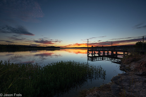 Sunset at the Pier by Jason Frels, A fishing pier on Inks Lake Texas at sunset.

<a href="https://jasonfrels.com/2021/10/19/evening-ref