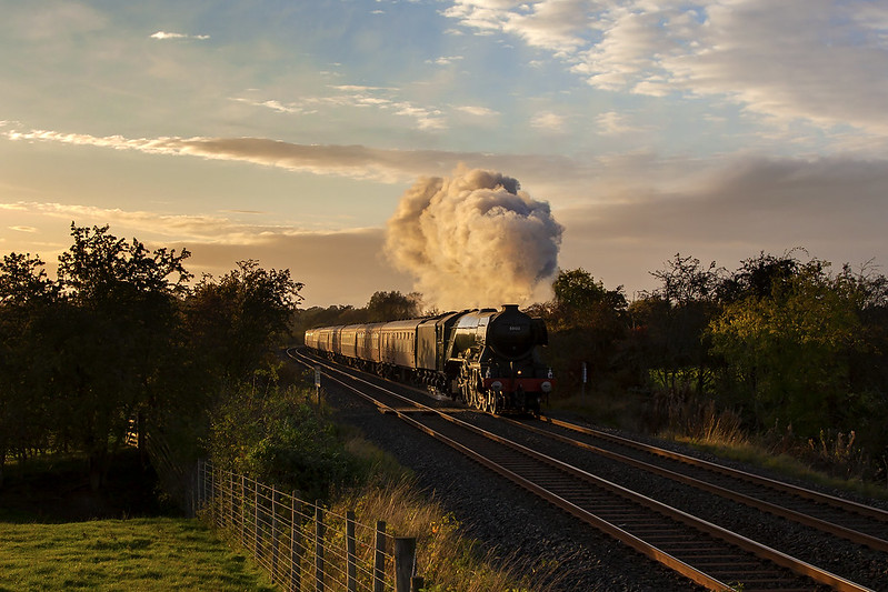 Not long before the sun disappears over the horizon, A3 Pacific No.60103 'Flying Scotsman' heads south past Cotehill.