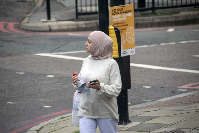 DSC_8389 London Bus Route #243 Dalston Kingsland Road Muslim Lady. Get your COVID-19 Coronavirus Vaccine Protect yourself and others