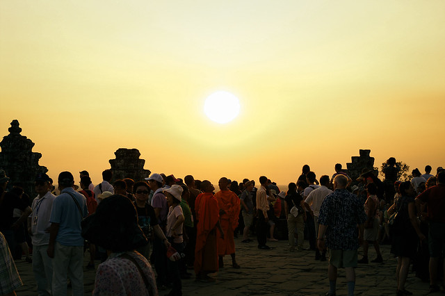 People awaiting the sunset on top of Phnom Bakheng, Angkor (Cambodia)