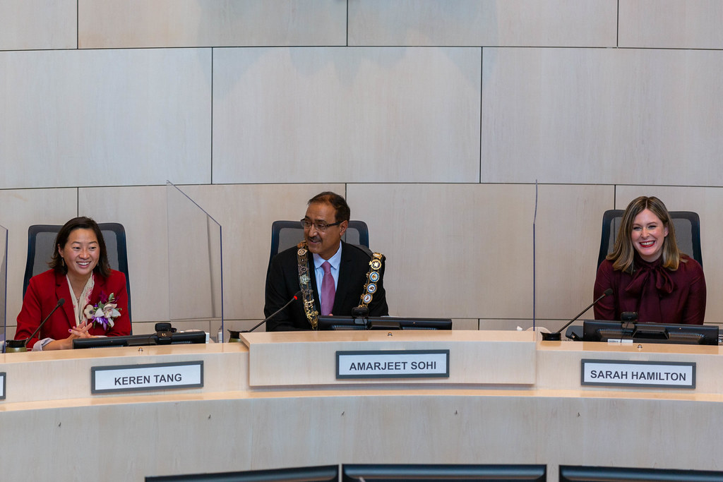 Coun. Keren Tang, Mayor Amarjeet Sohi, and Coun. Sarah Hamilton in council chambers for the inaugural meeting