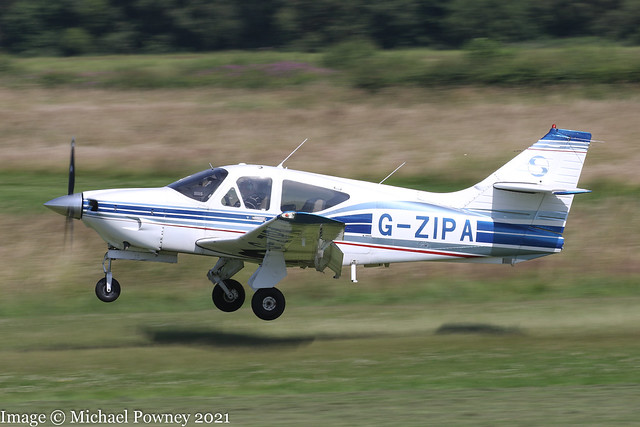 G-ZIPA - 1979 build Rockwell Commander 114A, arriving on Runway 26R at Barton