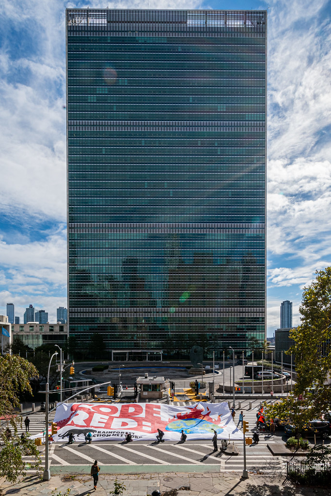 “CODE RED!” Activists Unfurl Massive Banner at NYC UN HQ to Demand Real Climate Action Ahead of Glasgow Climate Summit