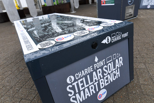 Solar-powered benches and bins beside the Between Forest and Skies V&A aluminium sculpture | by UK COP26