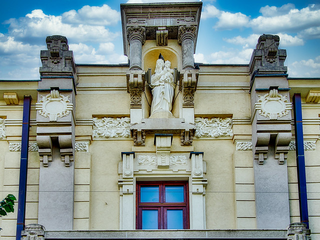Religious sculpture on a building's façade
