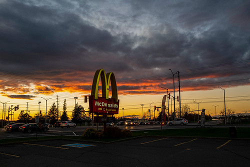 goldenhour arches mcdonal’s kanata ontario leicaq2 traffic intersection 365 onephotoaday day305 project3652021 sunset sky clouds light