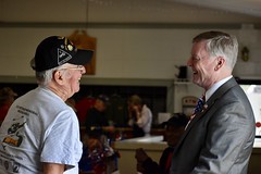State Rep. Mike France talks with veterans during a coffee gathering in late September.