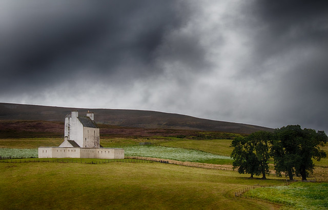 Views from the Cairngorm Snow Roads. Scotland. Corgarff Castle under lowering clouds.