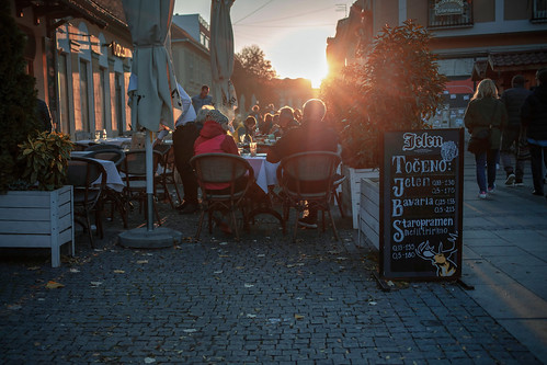 authentic candid café city citylife europe guests outdoors pavement people pub street sunset sunbeam terrace streetphotography town urban bracastefanovic belgrade serbia captainbebop