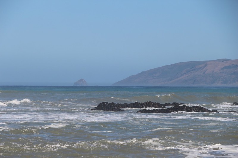 Zoomed-in view of Cape Mendocino and Sugarloaf Island from Mattole Beach on the Lost Coast Trail