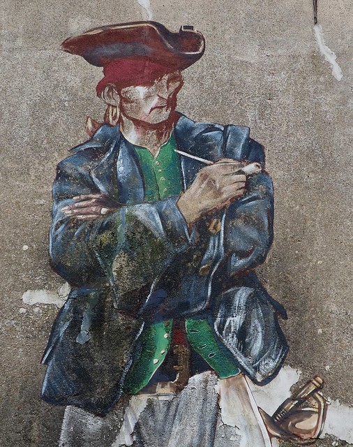 Mural of a pirate taking a smoke break.