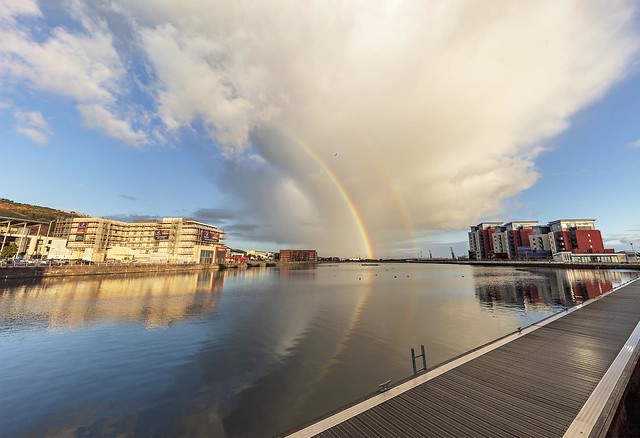 Double rainbow on the dockside