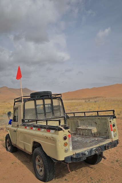Out-of-order abandoned 4WD car beside Lake Tamaying. Badain Jaran desert-Inner Mongolia-China-1070