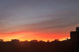 Orange, scarlet, and purple sky, sunset from Georgetown, Washington, D.C.