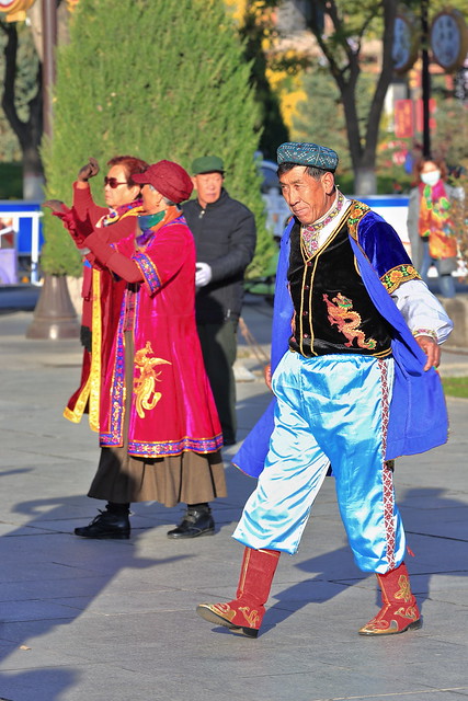 Dancers in Uyghur-style clothing at the city's Main Square. Zhangye-Gansu-China-1230