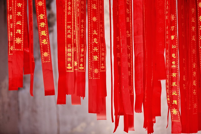 Red Buddhist prayer ribbons in the Qianfo-Thousand Buddha Grottoes of Mati Si-Horse Hoof Temple. Zhangye-Gansu-China-0932