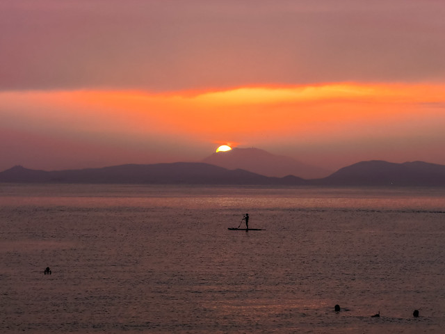 paddling in the sunset