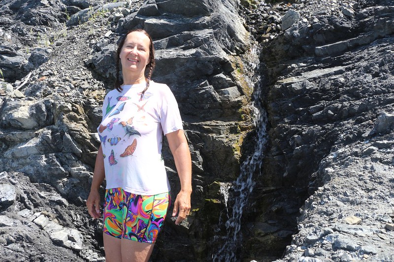Vicki soaked her hair to cool off on a small waterfall north of Shipman Creek on the Lost Coast Trail