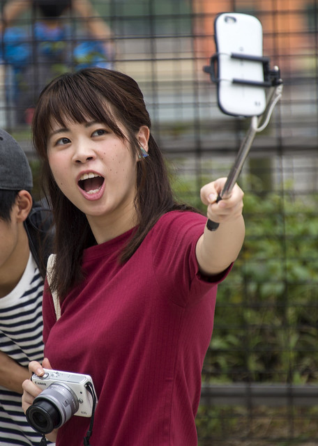 Japanese Girl Taking Selfie