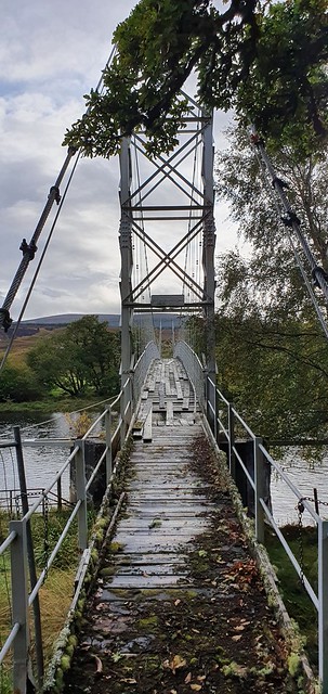 Disused suspension foot bridge over River Oykel