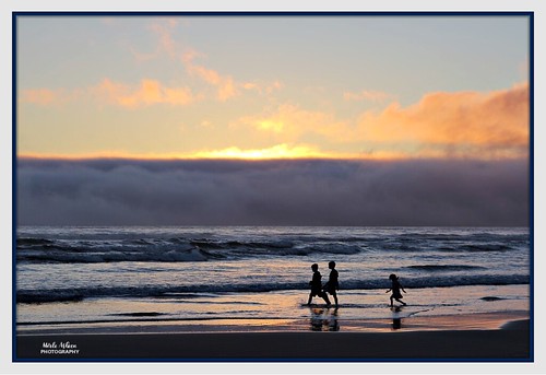 sunset twilgiht dusk beach ocean seascape water waterscene waterscape cannonbeach oregon nature tide walking kids children silhouettes