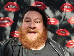 World Famous Celebrity Joseph Carrillo on Red Carpet in front of Lip Backdrop