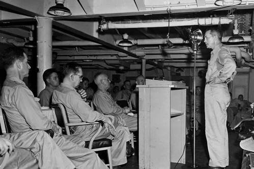 Secretary of the Navy Forrestal Talks to Correspondents and Officers