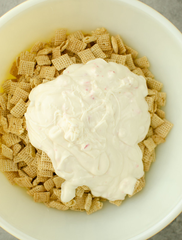 Chex cereal with melted white chocolate on top