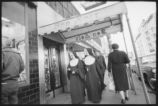 [Nuns walking under entrance canopy to Bon Soir nightclub] (LOC)