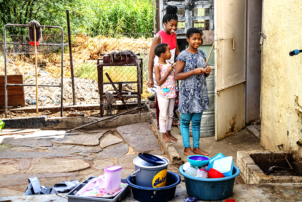Three girls at house with no running water on 11-13-21--Windhoek copy