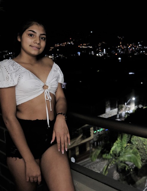 Cutie Maria at Night on the Balcony