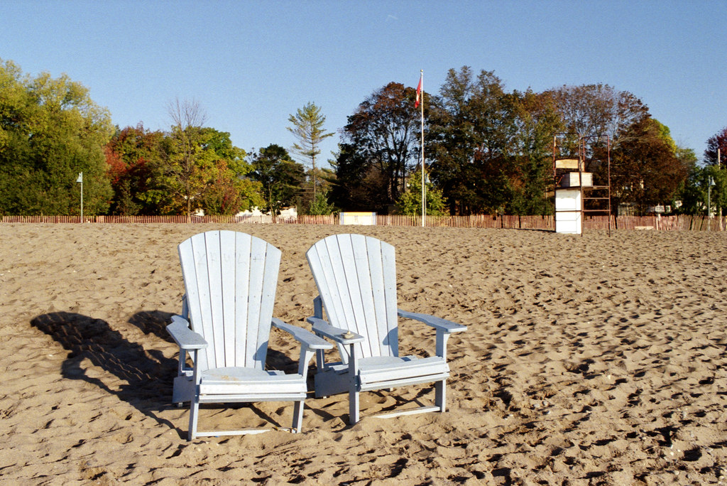 Two Muskoka Chairs on the Sand