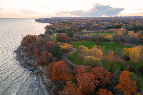 lakeontario ontario fall autumn drone photography path trees colours colors falling change sunset waves lake water clouds sky