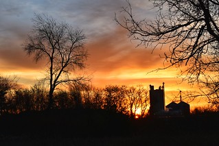 Sunrise Behind the Granary and Trees