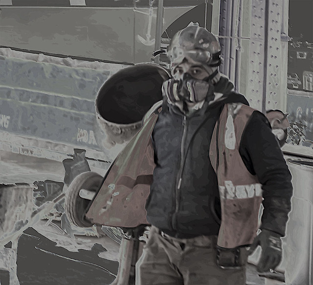 Hard Working Construction Worker in Full Protective Gear at South Street Seaport