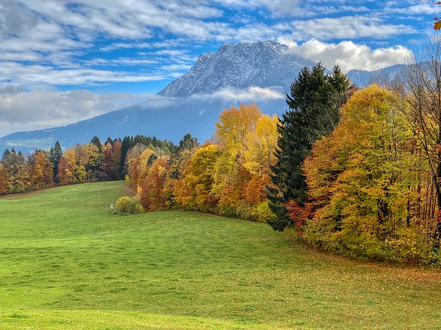 Autumnal landscape with Zahmer Kaiser mountain range seen from Breitenau near Kiefersfelden in Bavaria, Germany