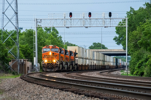 BNSF 6410 ES44AC leads 3 brethren west with a container train at Lisle, Ill.