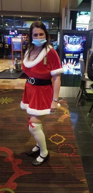 Christmas Season Cocktail Waitress in festive dress